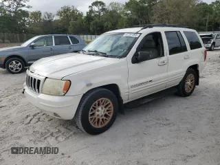 2002 Jeep Grand Cherokee Limited with VIN 1J4GX58S72C139972, listed as a Copart auction lot 47767395 with 163,395 mi miles and Salvage Title. Bid and sale history available at DreamBid. Image 1.