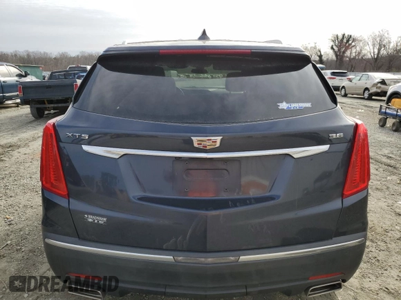 2017 Cadillac XT5 Premium Luxury FWD with VIN 1GYKNCRS5HZ198298, listed as a Copart auction lot 48212495 with 95,648 mi miles and Salvage Title. Bid and sale history available at DreamBid. Image 6.