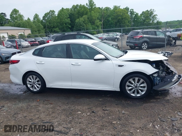 2018 Kia Optima S z VIN 5XXGT4L36JG233495, wystawiony jako IAAI lot #42284838 z przebiegiem 67 323 mil mil oraz . Historia ofert i sprzedaży dostępna na DreamBid. Obrazek 14.