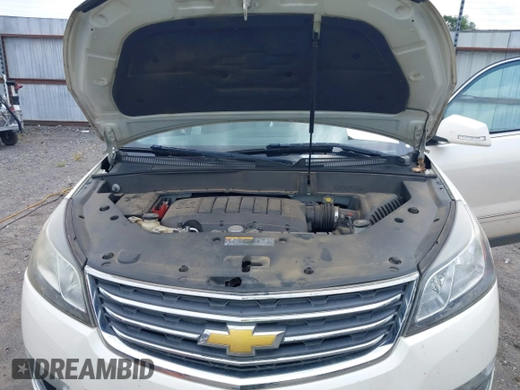 2014 Chevrolet Traverse LTZ with VIN 1GNKRJKD2EJ287211, listed as a IAAI auction lot 39873394 with 128,355 mi miles and . Bid and sale history available at DreamBid. Image 10.