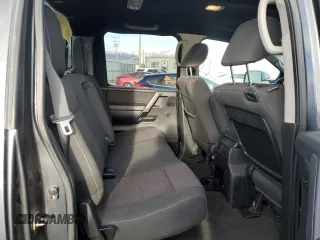 2013 Nissan Titan Pro-4X with VIN 1N6BA0EC2DN305708, listed as a Copart auction lot 45329275 with 68,636 mi miles and Salvage title. Bid and sale history available at DreamBid. Image 10.