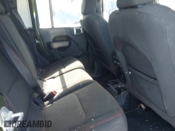 2023 Jeep Gladiator Rubicon with VIN 1C6JJTBG6PL576818, listed as a IAAI auction lot 41515428 with 10,271 mi miles and . Bid and sale history available at DreamBid. Image 8.