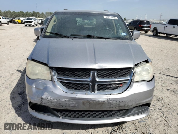 2014 Dodge Grand Caravan SXT with VIN 2C4RDGCG2ER273533, listed as a Copart auction lot 49228495 with 124,070 mi miles and Salvage Title. Bid and sale history available at DreamBid. Image 5.