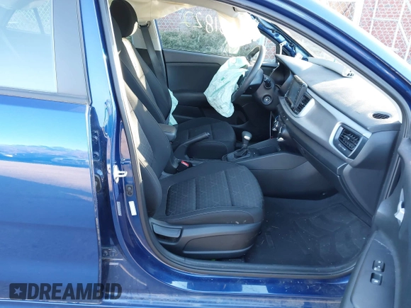 2020 Kia Rio S with VIN 3KPA25ADXLE260785, listed as a IAAI auction lot 41261822 with 28,433 mi miles and . Bid and sale history available at DreamBid. Image 5.