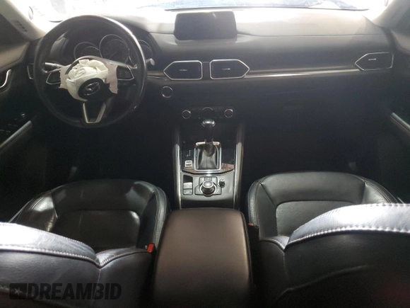 2018 Mazda CX-5 Grand Touring with VIN JM3KFBDM4J0412835, listed as a Copart auction lot 55441315 with 191,968 mi miles and Salvage title. Bid and sale history available at DreamBid. Image 8.