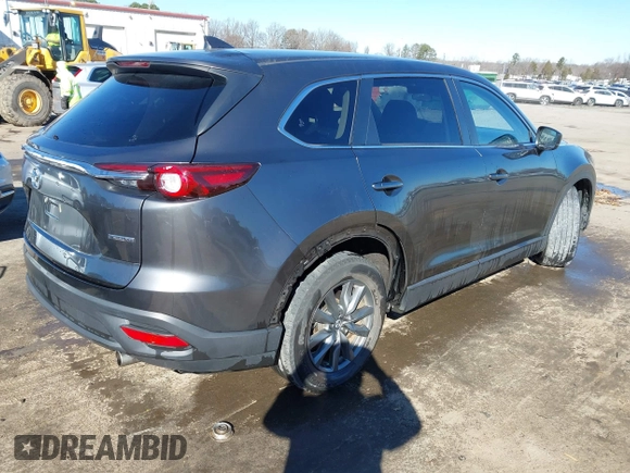 2022 Mazda CX-9 Sport with VIN JM3TCBBY5N0614589, listed as a IAAI auction lot 41295944 with 49,193 mi miles and . Bid and sale history available at DreamBid. Image 4.