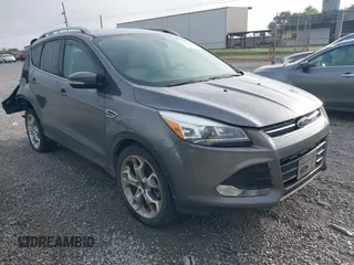 2014 Ford Escape Titanium с VIN 1FMCU0J97EUD22080, выставлен на аукционе IAAI как лот 42209151 с пробегом 94 227 миль миль и . История ставок и продаж доступна на DreamBid. Изображение 1.