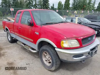 1997 Ford F-150 XL with VIN 1FTDX18W7VKD38972, listed as a IAAI auction lot 42832109 with 256,753 mi miles and . Bid and sale history available at DreamBid. Image 1.