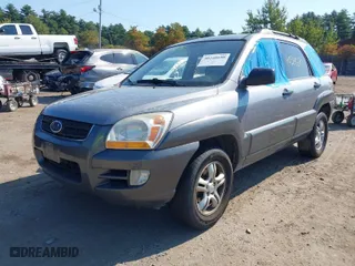 2008 Kia Sportage LX with VIN KNDJE723887542245, listed as a IAAI auction lot 40248690 with 122,558 mi miles. Bid and sale history available at carsss.com. Image 2.