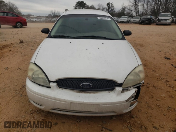 2004 Ford Taurus z VIN 1FAFP52214A194125, wystawiony jako Copart lot #43234295 z przebiegiem 216 877 mil mil oraz Szkody całkowita. Historia ofert i sprzedaży dostępna na DreamBid. Obrazek 5.