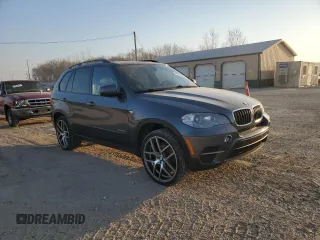 2013 BMW X5 xDrive35i z VIN 5UXZV4C54D0B06711, wystawiony jako Copart lot #48958535 z przebiegiem 201 650 mil mil oraz Czysty tytuł • Clean title. Historia ofert i sprzedaży dostępna na DreamBid. Obrazek 4.