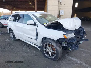 2020 Jeep Grand Cherokee Summit with VIN 1C4RJFJT0LC163752, listed as a IAAI auction lot 38725572 with 49,652 mi miles and . Bid and sale history available at DreamBid. Image 1.