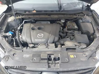 2016 Mazda CX-5 Grand Touring with VIN JM3KE4DY9G0845707, listed as a IAAI auction lot 41709685 with 96,351 mi miles. Bid and sale history available at carsss.com. Image 10.