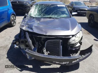 2018 Honda Civic EX с VIN 19XFC2F79JE040927, выставлен на аукционе Copart как лот 55696165 с пробегом 58 696 миль миль и Списание • Salvage title. История ставок и продаж доступна на DreamBid. Изображение 5.