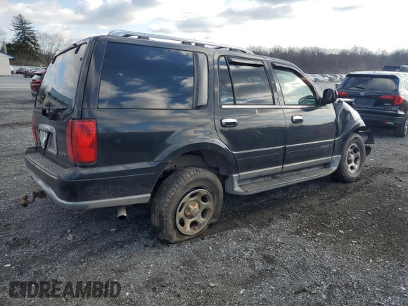 2001 Lincoln Navigator z VIN 5LMFU28R01LJ32925, wystawiony jako Copart lot #83013504 z przebiegiem 132 750 mil mil oraz Szkody całkowita. Historia ofert i sprzedaży dostępna na DreamBid. Obrazek 3.