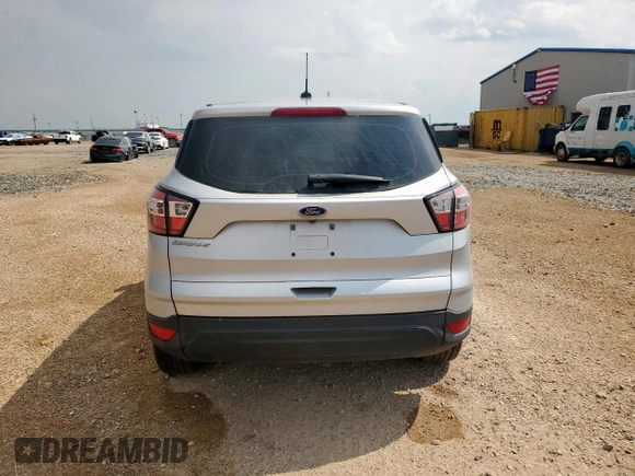 2018 Ford Escape S z VIN 1FMCU0F73JUD50086, wystawiony jako Copart lot #65004825 z przebiegiem Nie podano mil oraz Szkoda całkowita • Salvage title. Historia ofert i sprzedaży dostępna na DreamBid. Obrazek 6.
