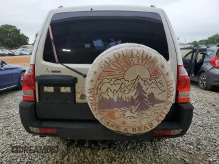 2003 Mitsubishi Montero Limited z VIN JA4NW51S23J020616, wystawiony jako Copart lot #56036365 z przebiegiem 200 785 mil mil oraz Szkody całkowita. Historia ofert i sprzedaży dostępna na DreamBid. Obrazek 6.