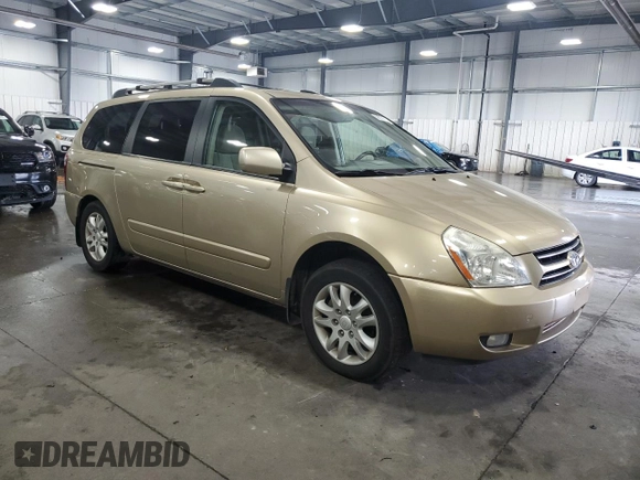2006 Kia Sedona LX with VIN KNDMB233666082464, listed as a Copart auction lot 69070644 with 244,445 mi miles and Salvage Title. Bid and sale history available at carsss.com. Image 4.