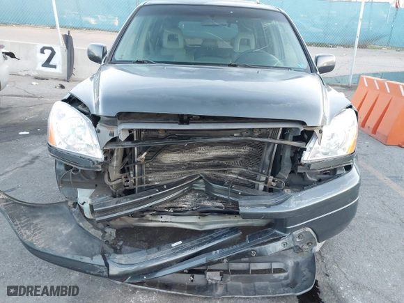 2005 Honda Pilot EX-L with NAVI with VIN 2HKYF187X5H514571, listed as a IAAI auction lot 41746538 with 276,994 mi miles. Bid and sale history available at carsss.com. Image 6.