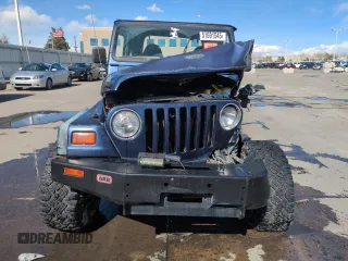 1997 Jeep Wrangler SE z VIN 1J4FY29P1VP441353, wystawiony jako Copart lot #51691545 z przebiegiem Nie podano mil oraz Szkoda całkowita • Salvage title. Historia ofert i sprzedaży dostępna na DreamBid. Obrazek 5.