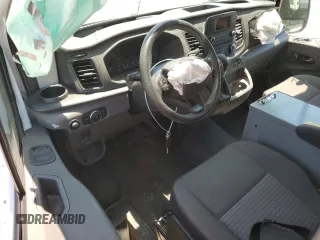 2023 Ford Transit Cargo z VIN 1FTBR1Y85PKB27419, wystawiony jako Copart lot #58053535 z przebiegiem Nie podano mil oraz Szkoda całkowita • Salvage title. Historia ofert i sprzedaży dostępna na DreamBid. Obrazek 8.