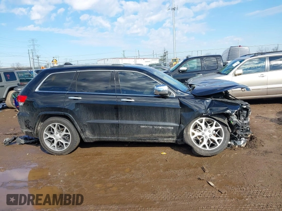 2019 Jeep Grand Cherokee Overland with VIN 1C4RJFCGXKC688543, listed as a IAAI auction lot 41643678 with 65,182 mi miles. Bid and sale history available at carsss.com. Image 14.