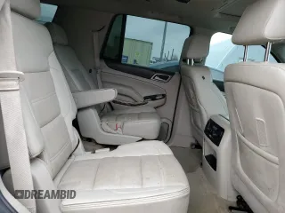 2015 GMC Yukon Denali with VIN 1GKS1CKJ1FR619793, listed as a Copart auction lot 86910314 with 128,559 mi miles and Salvage Title. Bid and sale history available at carsss.com. Image 11.