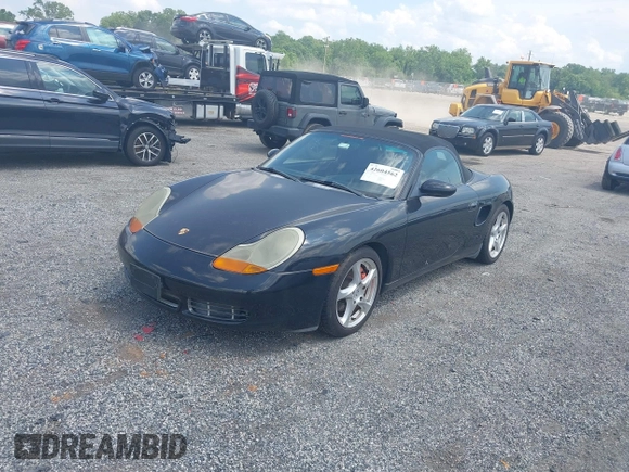 2002 Porsche Boxster S z VIN WP0CB29842U663272, wystawiony jako IAAI lot #42604562 z przebiegiem 68 927 mil mil oraz . Historia ofert i sprzedaży dostępna na DreamBid. Obrazek 2.