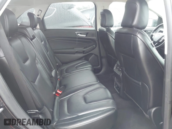 2021 Ford Edge Titanium z VIN 2FMPK3K99MBA16882, wystawiony jako IAAI lot #42214606 z przebiegiem 140 031 mil mil oraz . Historia ofert i sprzedaży dostępna na DreamBid. Obrazek 8.