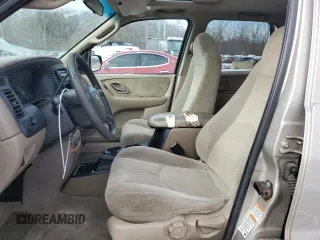 2001 Mazda Tribute LX with VIN 4F2CU081X1KM70119, listed as a Copart auction lot 89311935 with 176,851 mi miles and Salvage Title. Bid and sale history available at DreamBid. Image 7.