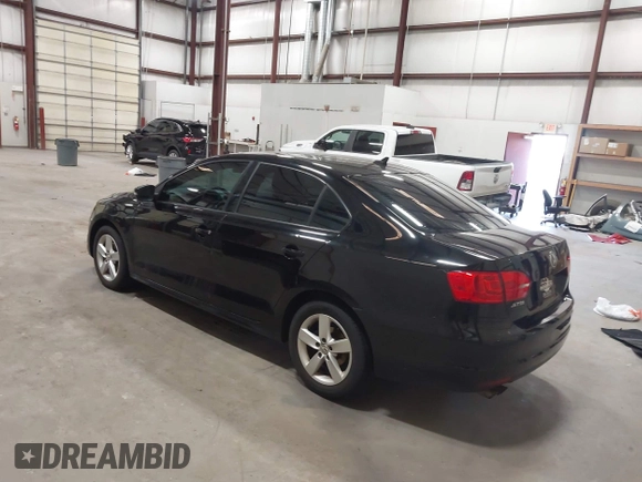 2014 Volkswagen Jetta SE with VIN 3VWD17AJ7EM409189, listed as a IAAI auction lot 42313804 with 139,950 mi miles and . Bid and sale history available at DreamBid. Image 3.