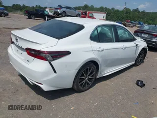 2023 Toyota Camry SE with VIN 4T1G11AK3PU784979, listed as a IAAI auction lot 42152149 with 49,070 mi miles. Bid and sale history available at carsss.com. Image 4.