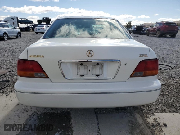 1997 Acura RL Premium Pkg with VIN JH4KA9655VC005115, listed as a Copart auction lot 48745265 with 0 mi miles and Salvage Title. Bid and sale history available at carsss.com. Image 6.