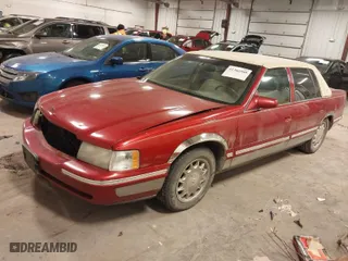1999 Cadillac DeVille with VIN 1G6KD54Y9XU774473, listed as a IAAI auction lot 41366980 with 140,248 mi miles. Bid and sale history available at carsss.com. Image 2.