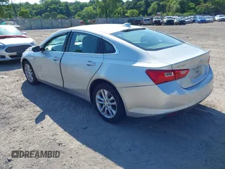 2018 Chevrolet Malibu LT with VIN 1G1ZD5STXJF109444, listed as a IAAI auction lot 42541320 with 164,137 mi miles and . Bid and sale history available at DreamBid. Image 3.