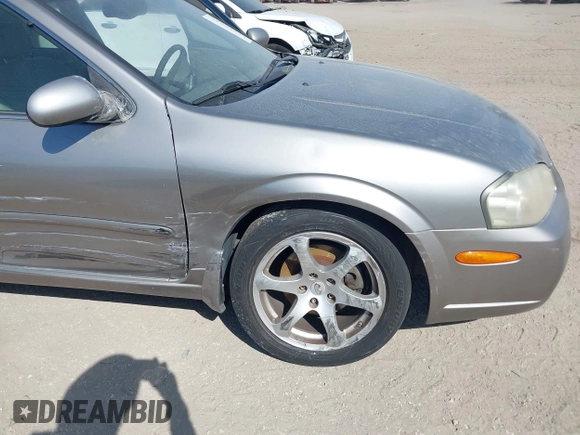 2003 Nissan Maxima GLE z VIN JN1DA31A83T411224, wystawiony jako IAAI lot #41905714 z przebiegiem Nie podano mil oraz . Historia ofert i sprzedaży dostępna na DreamBid. Obrazek 18.