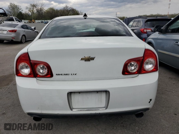 2012 Chevrolet Malibu LTZ with VIN 1G1ZG5E72CF279662, listed as a Copart auction lot 52764605 with 123,848 mi miles and Salvage Title. Bid and sale history available at DreamBid. Image 6.