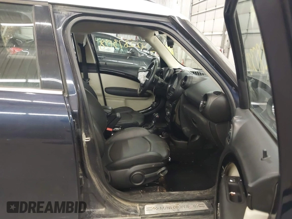 2014 MINI Countryman S with VIN WMWZC5C56EWP38017, listed as a IAAI auction lot 42287308 with 151,780 mi miles and . Bid and sale history available at DreamBid. Image 5.