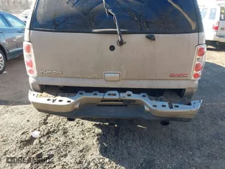 2005 GMC Yukon Denali with VIN 1GKEK63U45J192983, listed as a IAAI auction lot 41626897 with 294,072 mi miles. Bid and sale history available at carsss.com. Image 6.