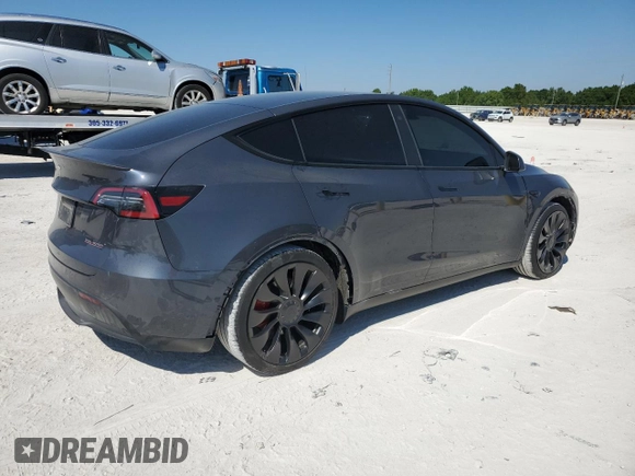 2022 Tesla Model Y Performance z VIN 7SAYGDEF5NF574382, wystawiony jako Copart lot #48531565 z przebiegiem 35 165 mil mil oraz Szkoda całkowita • Salvage title. Historia ofert i sprzedaży dostępna na DreamBid. Obrazek 3.