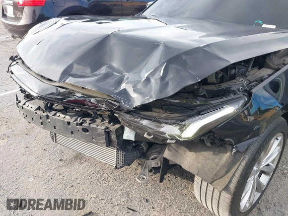 2022 Cadillac CT5 Premium Luxury z VIN 1G6DN5RK8N0118974, wystawiony jako IAAI lot #41265623 z przebiegiem 40 568 mil mil oraz . Historia ofert i sprzedaży dostępna na DreamBid. Obrazek 6.