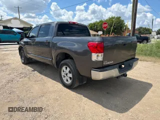 2012 Toyota Tundra with VIN 5TFEM5F12CX043550, listed as a Copart auction lot 66757495 with 241,901 mi miles and Clean title. Bid and sale history available at DreamBid. Image 3.