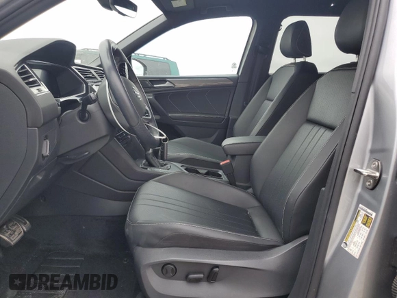 2023 Volkswagen Tiguan SE R-Line Black с VIN 3VVCB7AX4PM038156, выставлен на аукционе Copart как лот 58963155 с пробегом 24 871 миль миль и Списание • Salvage title. История ставок и продаж доступна на DreamBid. Изображение 7.