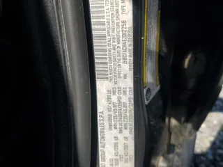 2014 FIAT 500L Lounge with VIN ZFBCFACH4EZ012256, listed as a Copart auction lot 52956725 with 114,014 mi miles and Salvage Title. Bid and sale history available at carsss.com. Image 13.