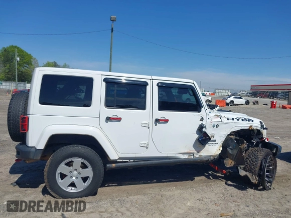 2017 Jeep Wrangler Unlimited Rubicon with VIN 1C4BJWFG9HL695361, listed as a IAAI auction lot 42010655 with 65,536 mi miles and . Bid and sale history available at DreamBid. Image 13.