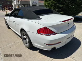 2009 BMW 6 Series 650i with VIN WBAEB53599C224302, listed as a Copart auction lot 55150865 with 123,706 mi miles and Salvage Title. Bid and sale history available at carsss.com. Image 3.