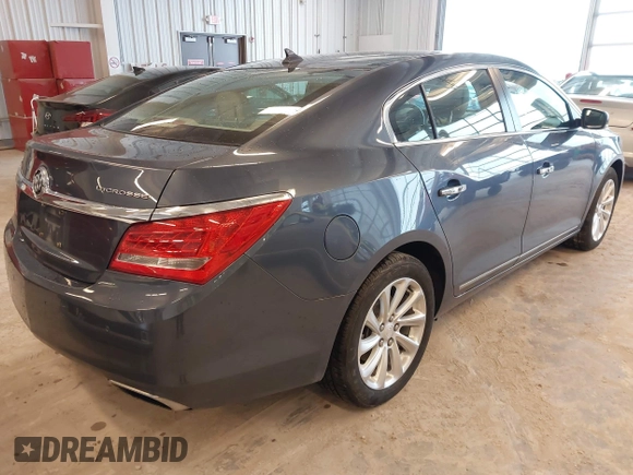2014 Buick LaCrosse Leather with VIN 1G4GB5G39EF132695, listed as a IAAI auction lot 41728596 with 124,639 mi miles and . Bid and sale history available at DreamBid. Image 4.