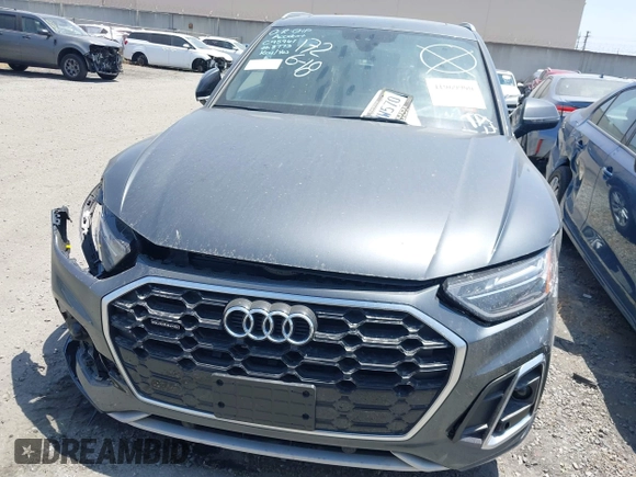 2022 Audi Q5 S line Premium z VIN WA1GAAFY3N2088773, wystawiony jako IAAI lot #41969990 z przebiegiem 22 922 mil mil oraz . Historia ofert i sprzedaży dostępna na DreamBid. Obrazek 13.