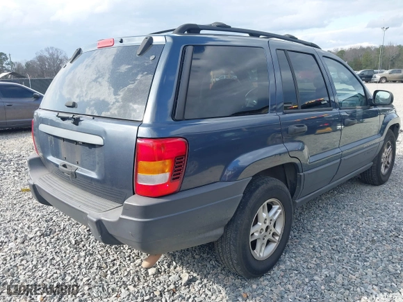 2004 Jeep Grand Cherokee Laredo with VIN 1J4GX48S14C324581, listed as a IAAI auction lot 41717938 with 213,178 mi miles. Bid and sale history available at carsss.com. Image 4.
