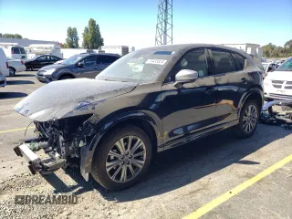 2024 Mazda CX-5 2.5 Turbo Signature with VIN JM3KFBXY4R0388868, listed as a Copart auction lot 73435824 with 5,540 mi miles and Salvage Title. Bid and sale history available at carsss.com. Image 1.